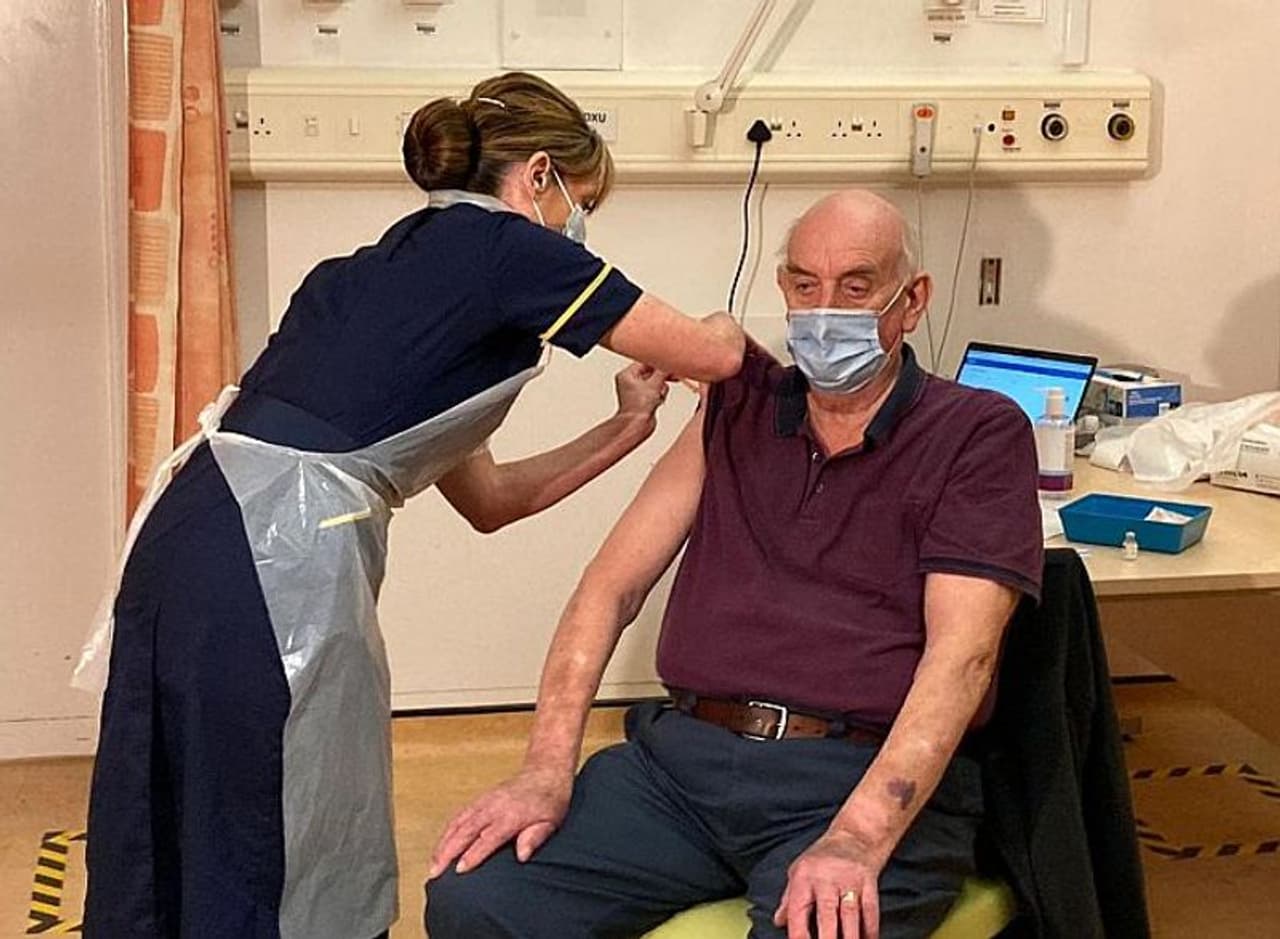 <p><strong>82 year old receives AstraZeneca/Oxford vaccine shot</strong><br /> </p><p>Brian Pinker, an 82 year old dialysis patient, is the first patient to receive the AstraZeneca/Oxford vaccine.<br /> </p><p>The retired maintenance manager was vaccinated by nurse Sam Foster at Oxford's Churchill Hospital.<br /> </p><p>The health secretary described it as a "pivotal moment" in the UK's fight against the virus. More than half a million doses of the vaccine are ready for use on Monday.</p> <p><strong>82 year old receives AstraZeneca/Oxford vaccine shot</strong><br /> </p><p>Brian Pinker, an 82 year old dialysis patient, is the first patient to receive the AstraZeneca/Oxford vaccine.<br /> </p><p>The retired maintenance manager was vaccinated by nurse Sam Foster at Oxford's Churchill Hospital.<br /> </p><p>The health secretary described it as a "pivotal moment" in the UK's fight against the virus. More than half a million doses of the vaccine are ready for use on Monday.</p>