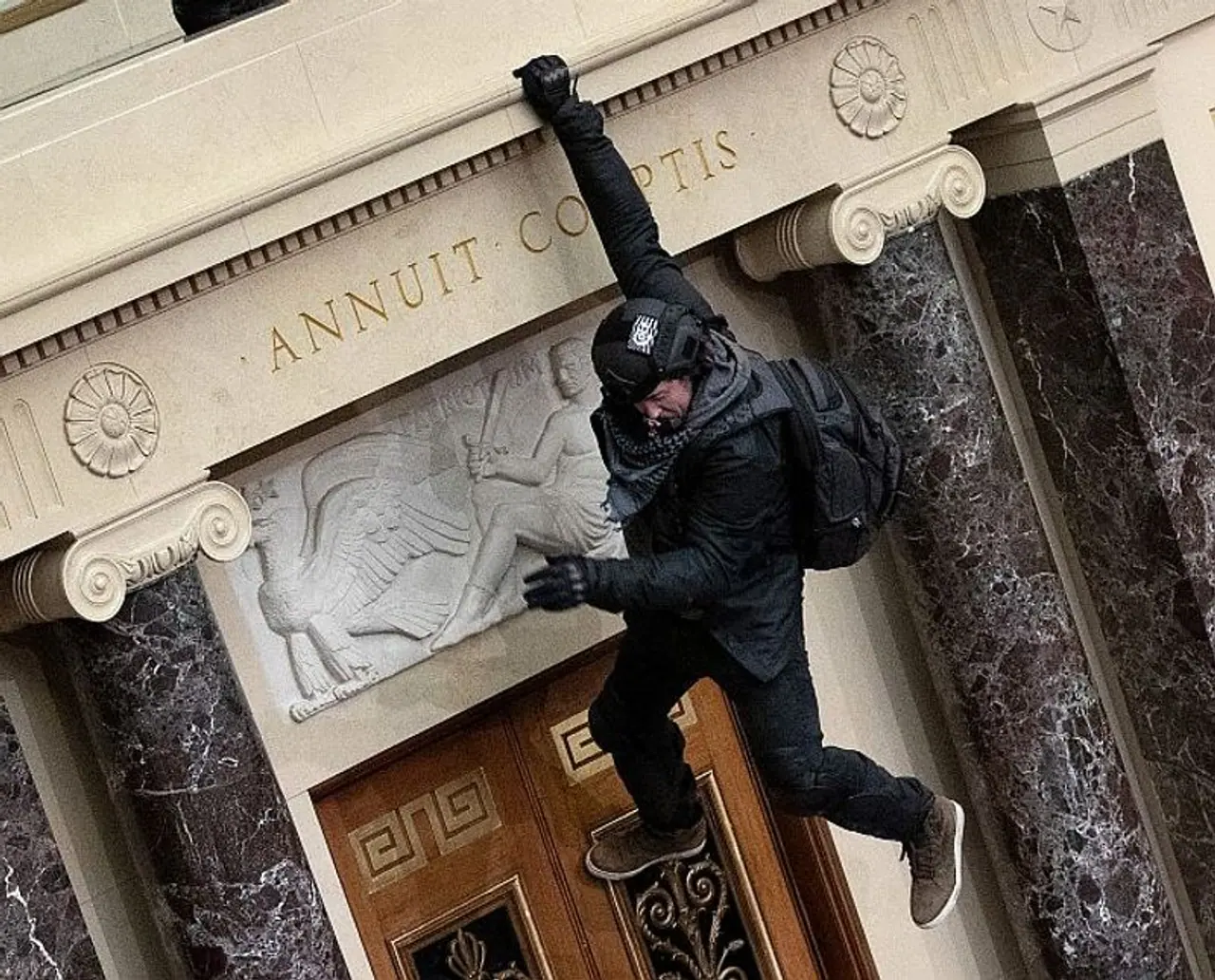 <p>A protester supporting U.S President Donald Trump jumps from the public gallery to the floor of the Senate chamber at the U.S. Capitol Building on January 6, 2021, in Washington, DC.<strong> Photograph: Win McNamee/Getty Images</strong></p> <p>A protester supporting U.S President Donald Trump jumps from the public gallery to the floor of the Senate chamber at the U.S. Capitol Building on January 6, 2021, in Washington, DC.<strong> Photograph: Win McNamee/Getty Images</strong></p>