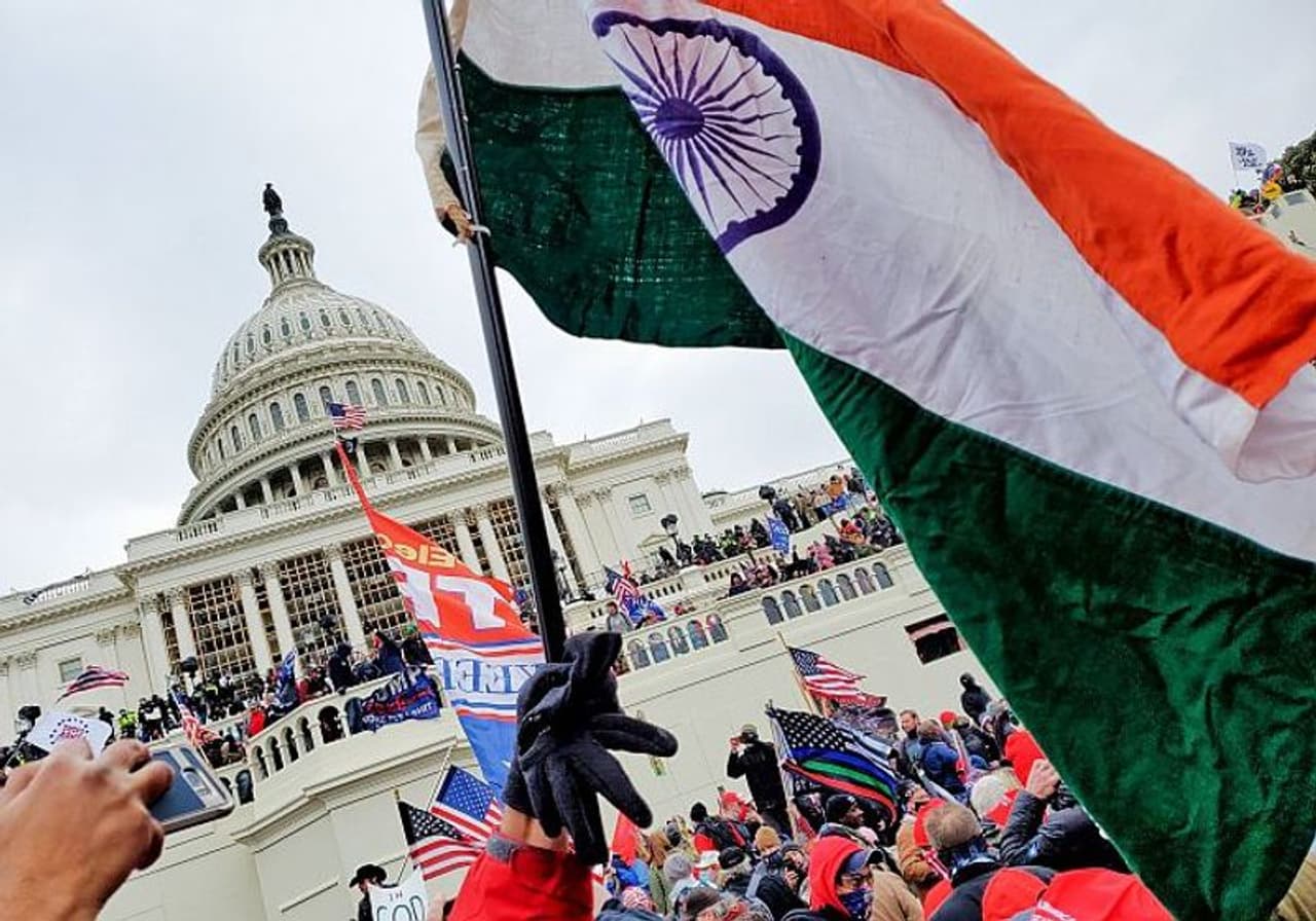 <p>Videos on social media showed Vincent Xavier Palathingal waving the Indian tricolour outside the Capitol Hill.<br /> </p><p>Vincent, a Republican hailing from Fairfax, Virginia, is vice president of FOMAA the largest Malayali organisation in the United States. Besides, he is also the vice chair of the Fairfax Republican community outreach.<br /> </p><p>Vincent said he participated in the demonstration at Capitol Hill because he believes that "massive voter fraud has happened" and that "peaceful protestors were exercising their rights".</p> <p>Videos on social media showed Vincent Xavier Palathingal waving the Indian tricolour outside the Capitol Hill.<br /> </p><p>Vincent, a Republican hailing from Fairfax, Virginia, is vice president of FOMAA the largest Malayali organisation in the United States. Besides, he is also the vice chair of the Fairfax Republican community outreach.<br /> </p><p>Vincent said he participated in the demonstration at Capitol Hill because he believes that "massive voter fraud has happened" and that "peaceful protestors were exercising their rights".</p>