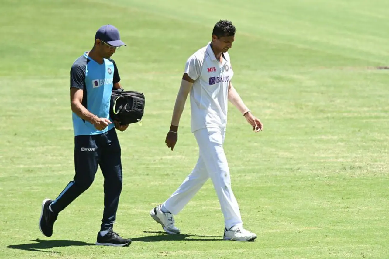 <p>India's woes with injuries continued even in the fourth and final Test against Australia, for the Border Gavaskar Trophy. On Day 1, at the Gabba in Brisbane, Indian pacer, Navdeep Saini became the latest to be added into the long growing list.</p> <p>India's woes with injuries continued even in the fourth and final Test against Australia, for the Border Gavaskar Trophy. On Day 1, at the Gabba in Brisbane, Indian pacer, Navdeep Saini became the latest to be added into the long growing list.</p>