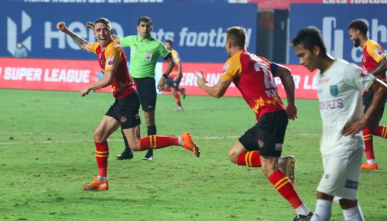 <p>In what turned out to be a thrilling encounter, SC East Bengal settled for a 1 1 draw against Kerala Blasters in the 2020 21 Indian Super League (ISL), at the Tilak Maidan in Goa, on Friday. With this, SCEB stayed on ninth, while Kerala remained on the tenth.</p> <p>In what turned out to be a thrilling encounter, SC East Bengal settled for a 1 1 draw against Kerala Blasters in the 2020 21 Indian Super League (ISL), at the Tilak Maidan in Goa, on Friday. With this, SCEB stayed on ninth, while Kerala remained on the tenth.</p>