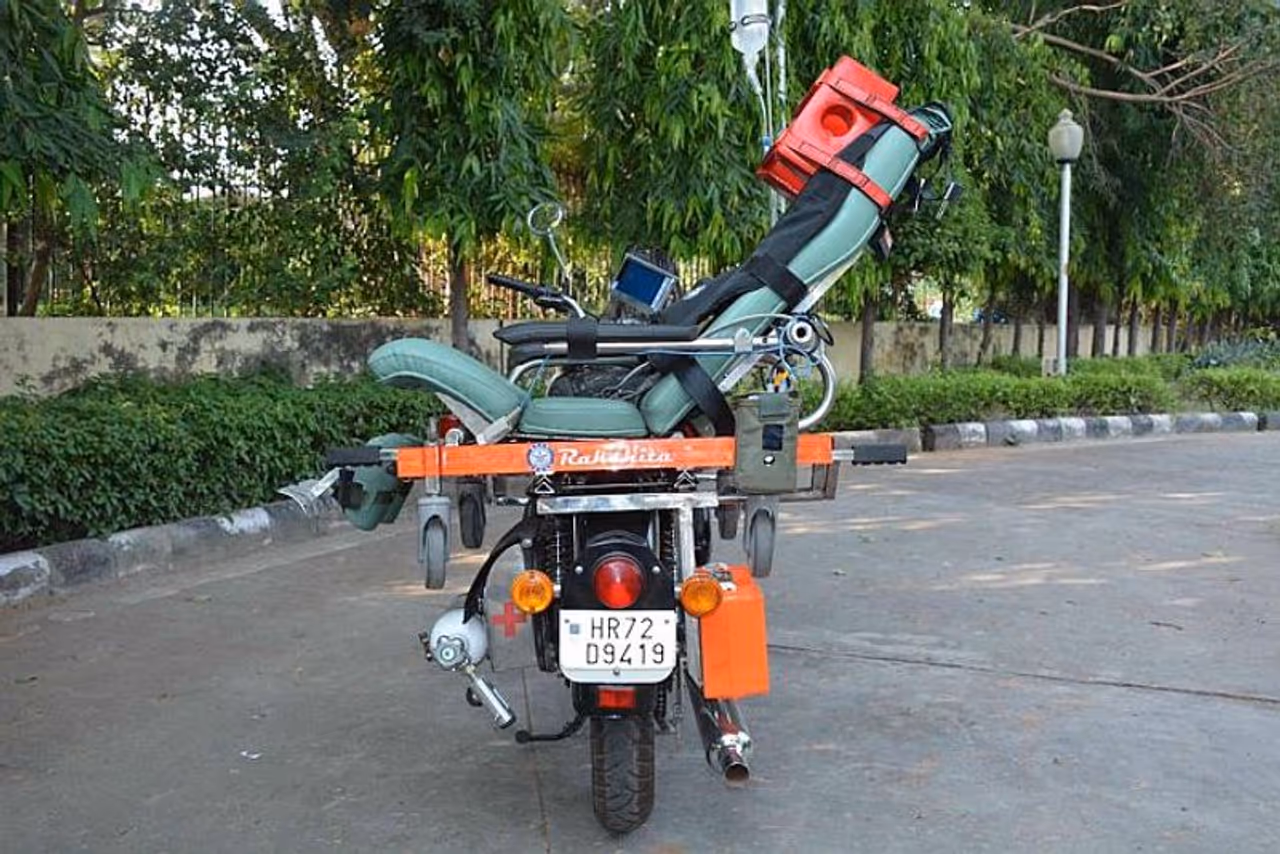 <p>The bike ambulance would help in overcoming the problems faced by security forces and emergency healthcare providers. <br /> </p><p>"It will provide life saving aid for the evacuation of injured patients from low intensity conflict areas. This will be handy in the congested streets and remote locations, where access through ambulance is difficult and time consuming," the DRDO said.<br /> </p><p>The bike can respond to a medical emergency faster than a four wheeler due to its functionality and integrated emergency medical support system.</p> <p>The bike ambulance would help in overcoming the problems faced by security forces and emergency healthcare providers. <br /> </p><p>"It will provide life saving aid for the evacuation of injured patients from low intensity conflict areas. This will be handy in the congested streets and remote locations, where access through ambulance is difficult and time consuming," the DRDO said.<br /> </p><p>The bike can respond to a medical emergency faster than a four wheeler due to its functionality and integrated emergency medical support system.</p>