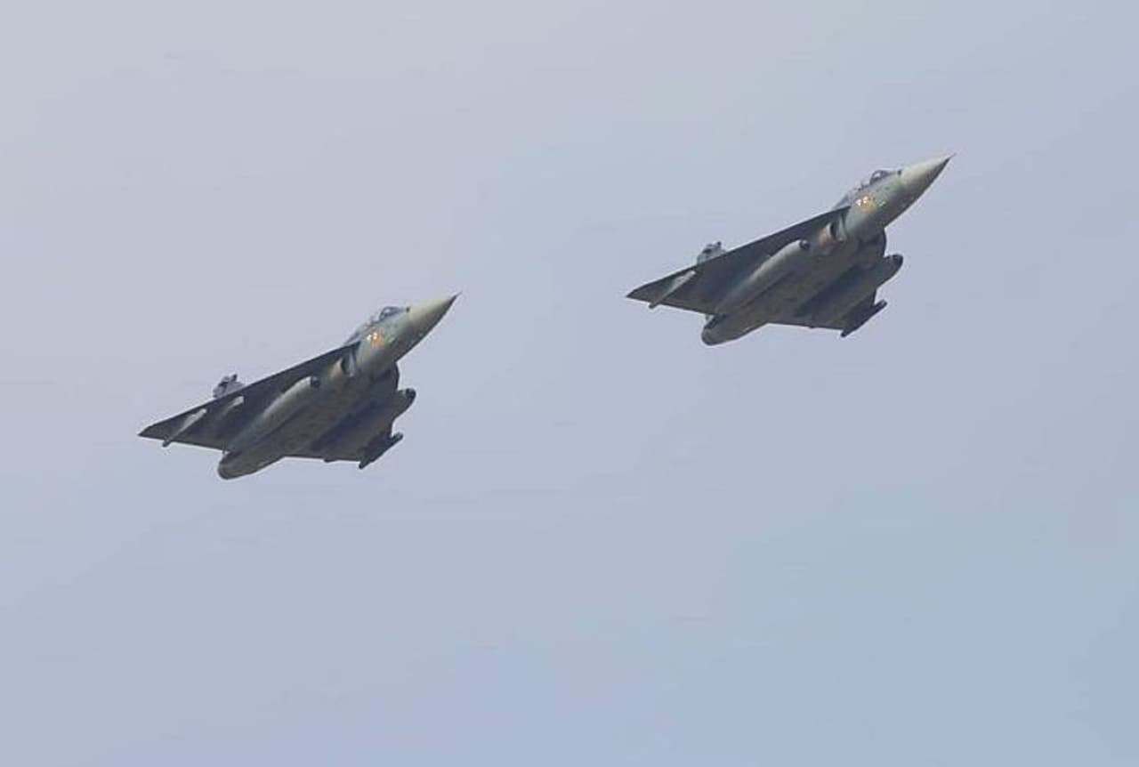 <p>Revealing various price components of project Light Combat Aircraft Tejas Mk 1A, Madhavan said that half of total price of contract which has been recently awarded by the government is mostly made of spares, tax component and ground equipment which comes to Rs 22,000 crore while the actual price is Rs 25,000 crore for 83 LCA Tejas.<br /> </p><p>In fact, a Tejas Mk 1A would cost Rs 309 crore and its export version minus taxes will cost lesser than this, the HAL CMD said.<br /> </p><p>The trainer version of Tejas will cost Rs 288 crore. The revised qualitative requirements for 8 trainer Tejas aircraft have recently been given by the Indian Air Force. Mid air refuelling system has been added in the revised format.</p> <p>Revealing various price components of project Light Combat Aircraft Tejas Mk 1A, Madhavan said that half of total price of contract which has been recently awarded by the government is mostly made of spares, tax component and ground equipment which comes to Rs 22,000 crore while the actual price is Rs 25,000 crore for 83 LCA Tejas.<br /> </p><p>In fact, a Tejas Mk 1A would cost Rs 309 crore and its export version minus taxes will cost lesser than this, the HAL CMD said.<br /> </p><p>The trainer version of Tejas will cost Rs 288 crore. The revised qualitative requirements for 8 trainer Tejas aircraft have recently been given by the Indian Air Force. Mid air refuelling system has been added in the revised format.</p>