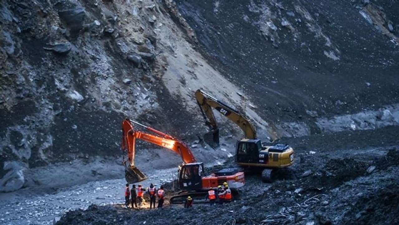 <p>Thirty one bodies have been recovered so far from disaster hit areas of Chamoli district in Uttarakhand. <br /> </p><p>Rescuers have extricated 12 people from the rubble.<br /> </p><p>Giving details regarding the avalanche in the upper catchment of Rishiganga River in Chamoli, Union Home Minister Amit Shah informed Parliament earlier today that as per satellite data from February 7, a landslide triggered a snow avalanche that covered approximately 14 sqkm area and caused a flash flood in the downstream of the Rishi Ganga River.</p> <p>Thirty one bodies have been recovered so far from disaster hit areas of Chamoli district in Uttarakhand. <br /> </p><p>Rescuers have extricated 12 people from the rubble.<br /> </p><p>Giving details regarding the avalanche in the upper catchment of Rishiganga River in Chamoli, Union Home Minister Amit Shah informed Parliament earlier today that as per satellite data from February 7, a landslide triggered a snow avalanche that covered approximately 14 sqkm area and caused a flash flood in the downstream of the Rishi Ganga River.</p>