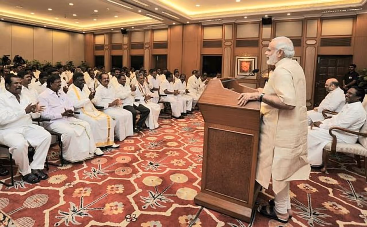 <p>A day after Prime Minister Narendra Modi announced that the Devendrakula Vellalar will now be known by their heritage name and not the six to seven names listed in the Schedule to the Constitution, the community has assured the former of their life long support.<br /> </p><p>Thangaraj, the chairman of the Devendra Voluntary Trust who has been pushing for the long standing demand of declaring seven caste subdivisions as Devendra Kula Vellalar, has assured Prime Minister Narendra Modi of the community's complete and permanent support.<br /> </p><p>The people belonging to the seven subdivisions of Devendra Kulathan, Kadayan, Kaladi, Kudumban, Pallan, Pannadi and Vathiriyan had been demanding for a long time that they should be united and called Devendrakula Vellalar.</p> <p>A day after Prime Minister Narendra Modi announced that the Devendrakula Vellalar will now be known by their heritage name and not the six to seven names listed in the Schedule to the Constitution, the community has assured the former of their life long support.<br /> </p><p>Thangaraj, the chairman of the Devendra Voluntary Trust who has been pushing for the long standing demand of declaring seven caste subdivisions as Devendra Kula Vellalar, has assured Prime Minister Narendra Modi of the community's complete and permanent support.<br /> </p><p>The people belonging to the seven subdivisions of Devendra Kulathan, Kadayan, Kaladi, Kudumban, Pallan, Pannadi and Vathiriyan had been demanding for a long time that they should be united and called Devendrakula Vellalar.</p>