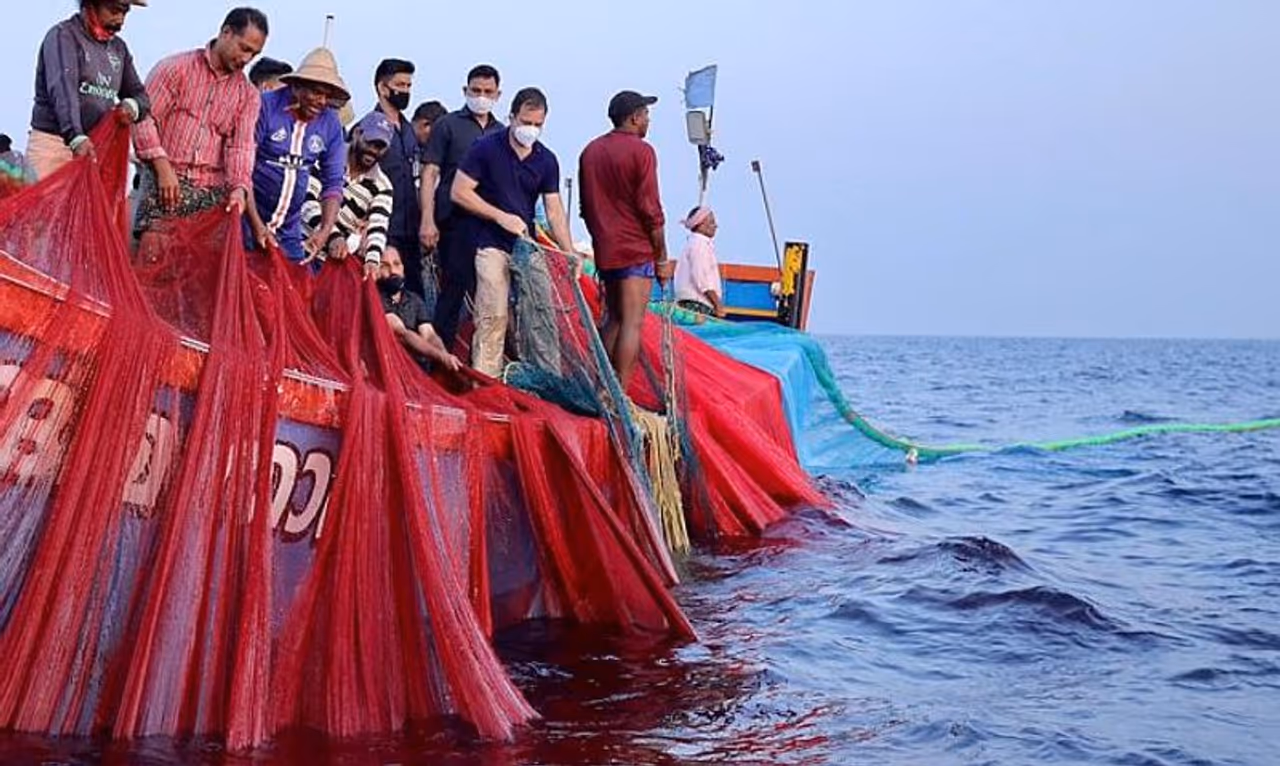 <p>Congress leader Rahul Gandhi went fishing in the waters of the Arabian Sea with a group of fishermen in Kerala, but the trip didn't yield any fish but controversy.<br /> </p><p>Dressed in a blue shirt and trousers, Rahul hopped on to a boat at Thangasseri in Kollam.<br /> </p><p>Photographs showed Rahul working furiously at the nets along with the fishermen. The effort though did not yield any fish.</p> <p>Congress leader Rahul Gandhi went fishing in the waters of the Arabian Sea with a group of fishermen in Kerala, but the trip didn't yield any fish but controversy.<br /> </p><p>Dressed in a blue shirt and trousers, Rahul hopped on to a boat at Thangasseri in Kollam.<br /> </p><p>Photographs showed Rahul working furiously at the nets along with the fishermen. The effort though did not yield any fish.</p>