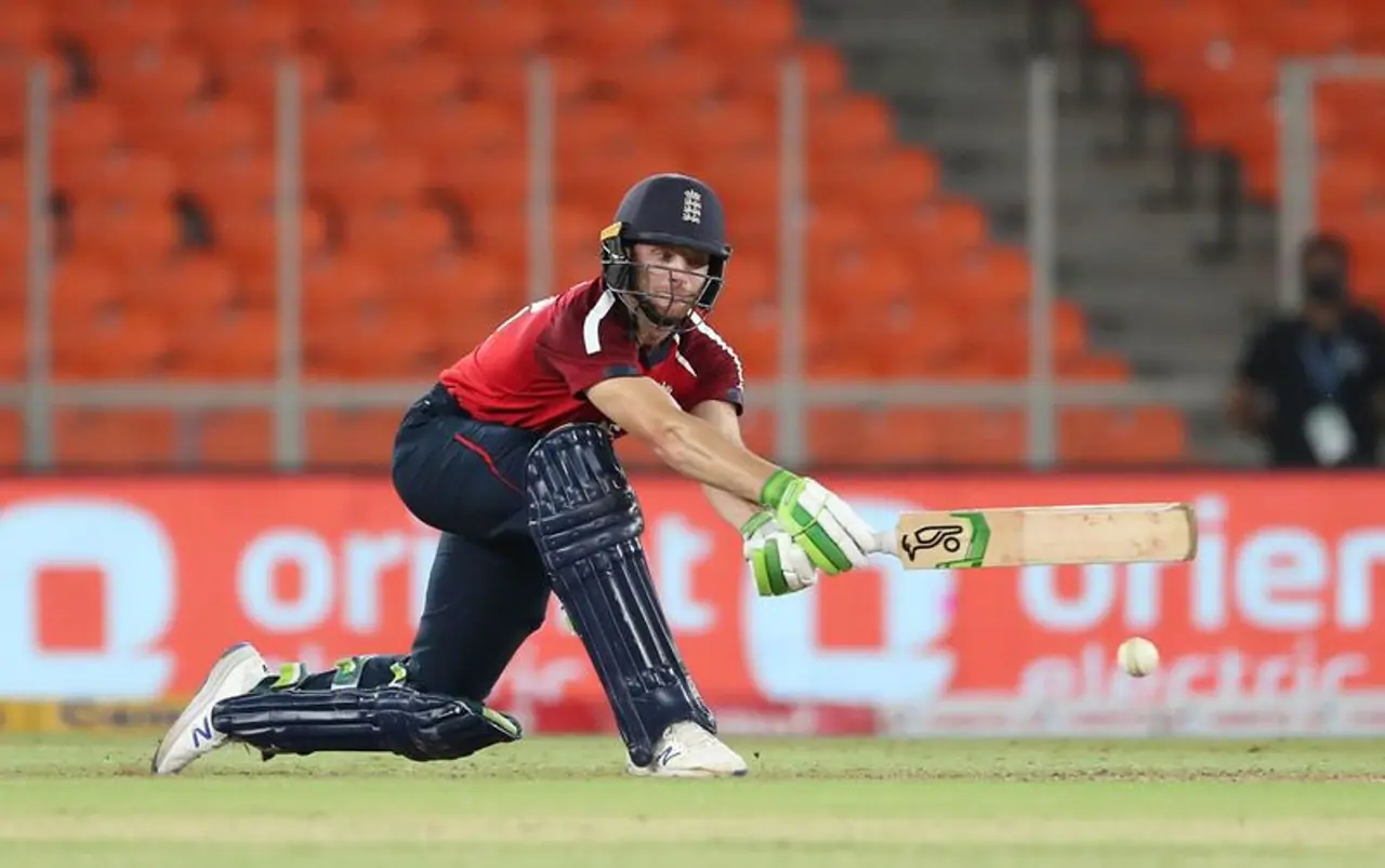 <p>England produced another acceptable batting performance to tame India in the third Twenty20 International at the Narendra Modi Stadium in Ahmedabad on Tuesday. Wicketkeeper opening batsman Jos Buttler's unbeaten 83 ensured England regained the lead in the series and retained the top spot in the ICC T20I Rankings.</p> <p>England produced another acceptable batting performance to tame India in the third Twenty20 International at the Narendra Modi Stadium in Ahmedabad on Tuesday. Wicketkeeper opening batsman Jos Buttler's unbeaten 83 ensured England regained the lead in the series and retained the top spot in the ICC T20I Rankings.</p>