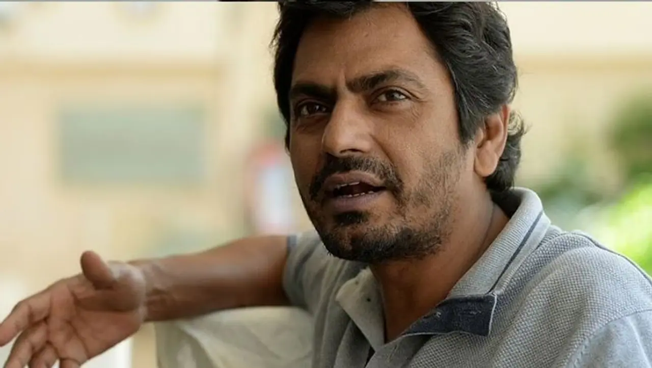 <p style="text align: justify;">In an interview with SpotboyE, when Nawazuddin Siddiqui was asked what he thinks about the celebs having a vacation in the Maldives. He said, “These entertainment celebrities posting vacation pictures at a time when the world is reeling under the worst recession. ...Logon ke pass khana nahin hai aur aap paise phenk rahe ho . Kuch toh sharm karo.”</p> <p style="text align: justify;">In an interview with SpotboyE, when Nawazuddin Siddiqui was asked what he thinks about the celebs having a vacation in the Maldives. He said, “These entertainment celebrities posting vacation pictures at a time when the world is reeling under the worst recession. ...Logon ke pass khana nahin hai aur aap paise phenk rahe ho . Kuch toh sharm karo.”</p>