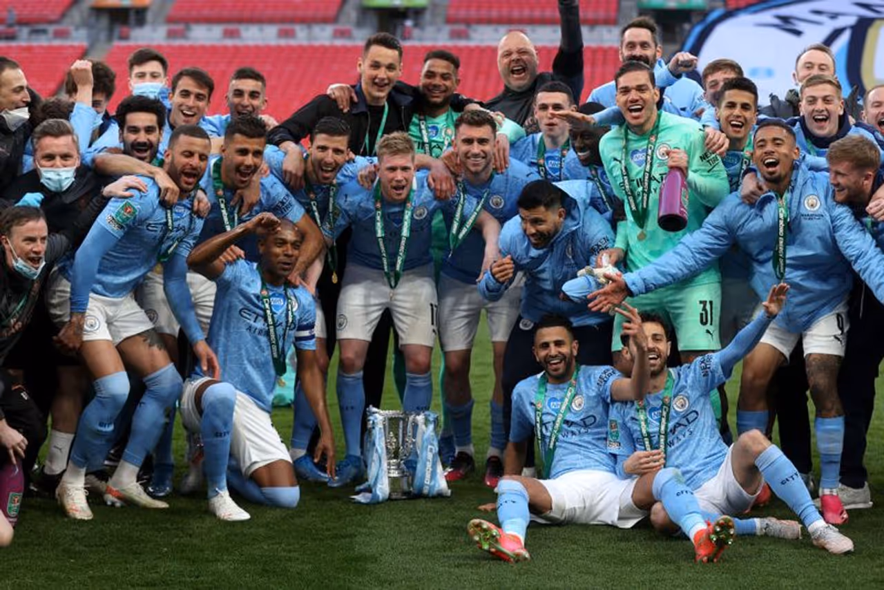 <p>English football giant Manchester City scripted history by winning the 2020 21 Carabao Cup (EFL Cup or League Cup). It beat Tottenham Hotspur 1 0 at the Wimbley Stadium in London on Sunday.</p> <p>English football giant Manchester City scripted history by winning the 2020 21 Carabao Cup (EFL Cup or League Cup). It beat Tottenham Hotspur 1 0 at the Wimbley Stadium in London on Sunday.</p>