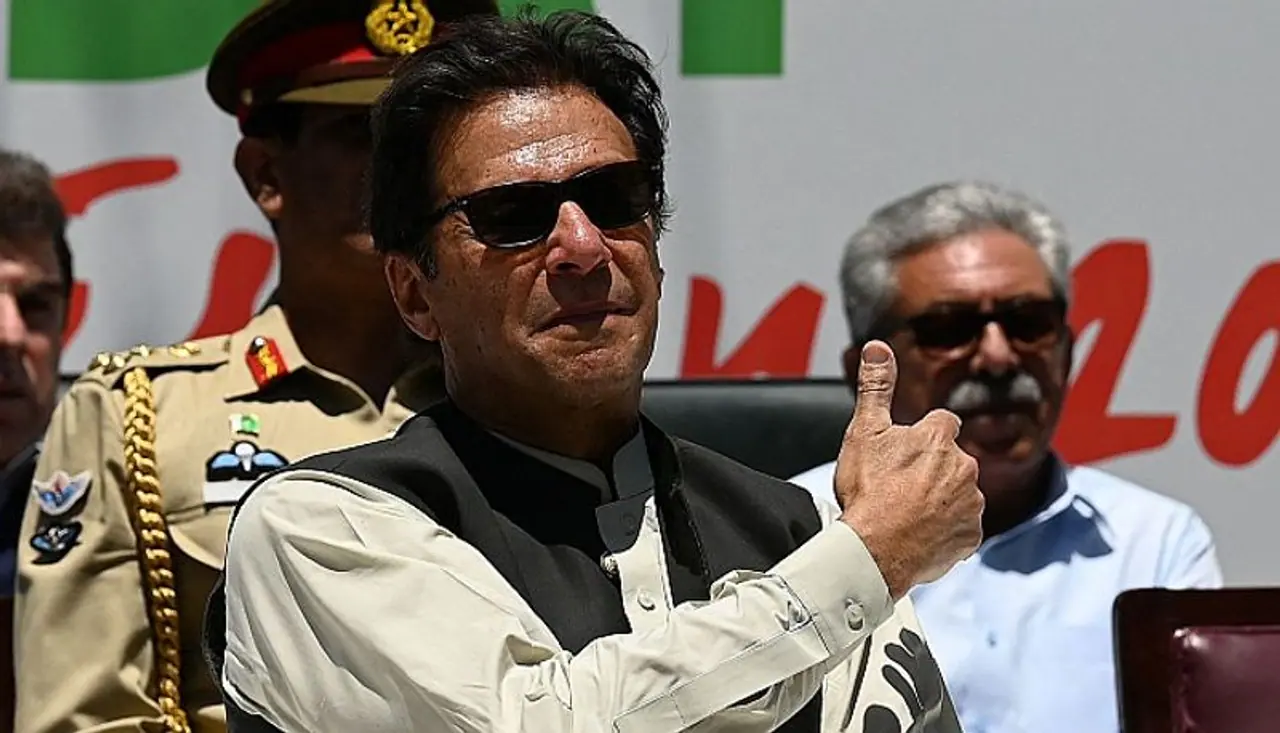 Pakistan Prime Minister Imran Khan attends an event after planting a tree during his visit to inspect the progress of 10 Billion Tree Tsunami campaign in Makhniyal area of Haripur district, in northwest Khyber Pakhtunkhwa on May 27, 2021, which he had launched to mitigate the effects of climate change as Pakistan is set to host World Environment Day 2021 in partnership with the UN Environment Programme (UNEP) on June 5. Photograph: Aamir Qureshi/AFP/Getty Images