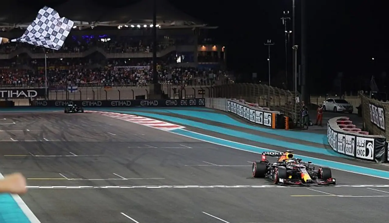 Image: Race winner Max Verstappen of the Netherlands driving the (33) Red Bull Racing RB16B Honda takes the chequered flag during the F1 Grand Prix of Abu Dhabi at Yas Marina Circuit in Abu Dhabi, United Arab Emirates. Photograph: Kamran Jebreili/Pool/Getty Images