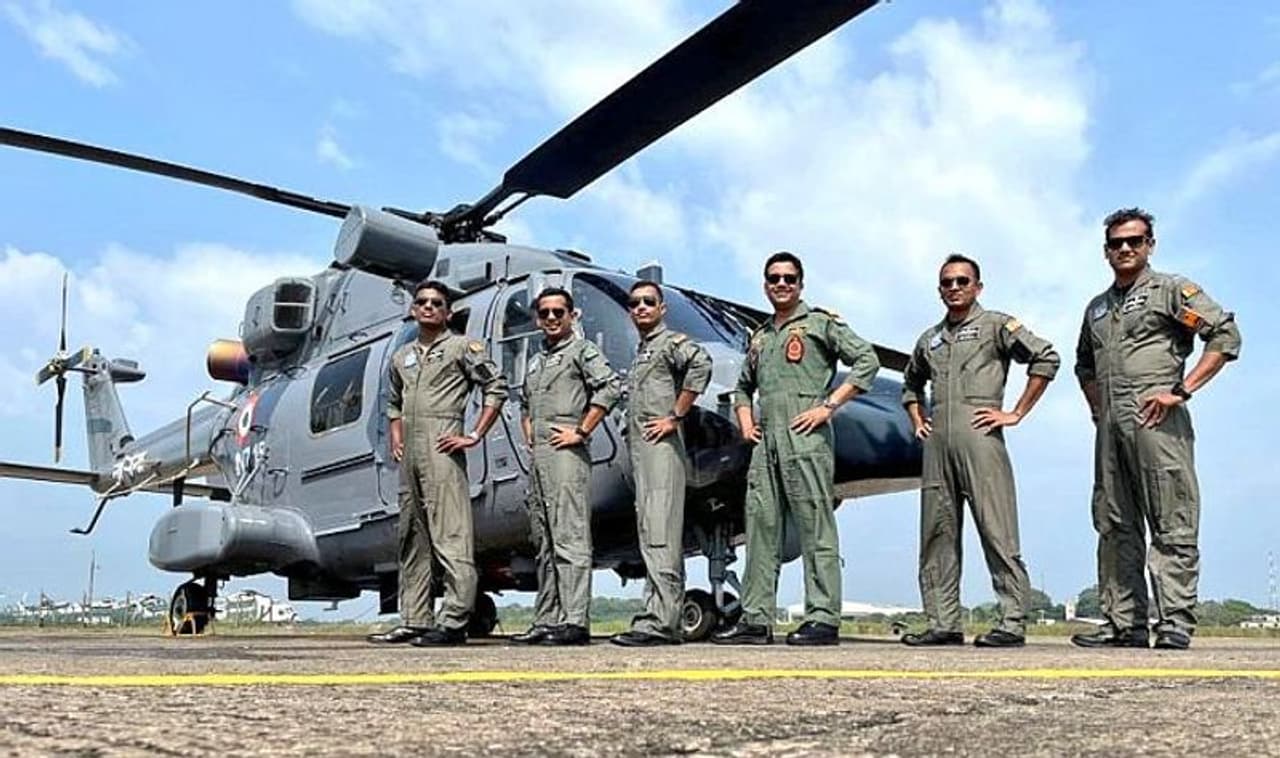 <I>Navy personnel pose next to the Advanced Light Helicopter</I> <I>Navy personnel pose next to the Advanced Light Helicopter</I>