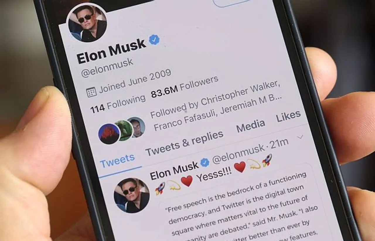 Image: In this photo illustration, Tesla and SpaceX CEO Elon Musk's twitter profile is displayed on a mobile phone screen. Photograph: Celal Gunes/Anadolu Agency via Getty Images
