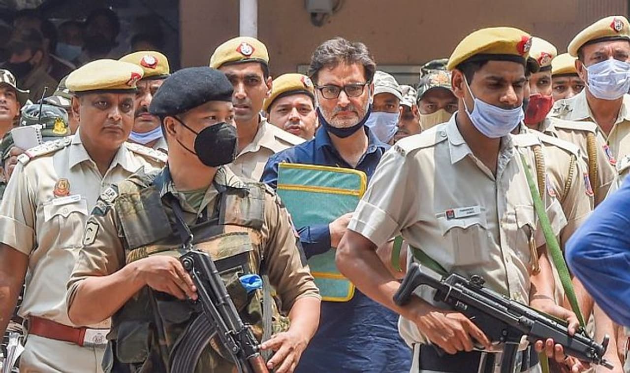 <I>Image: Kashmiri separatist leader Yasin Malik at the Patiala House court, in New Delhi. Photograph: Manvender Vashist/PTI Photo</I>