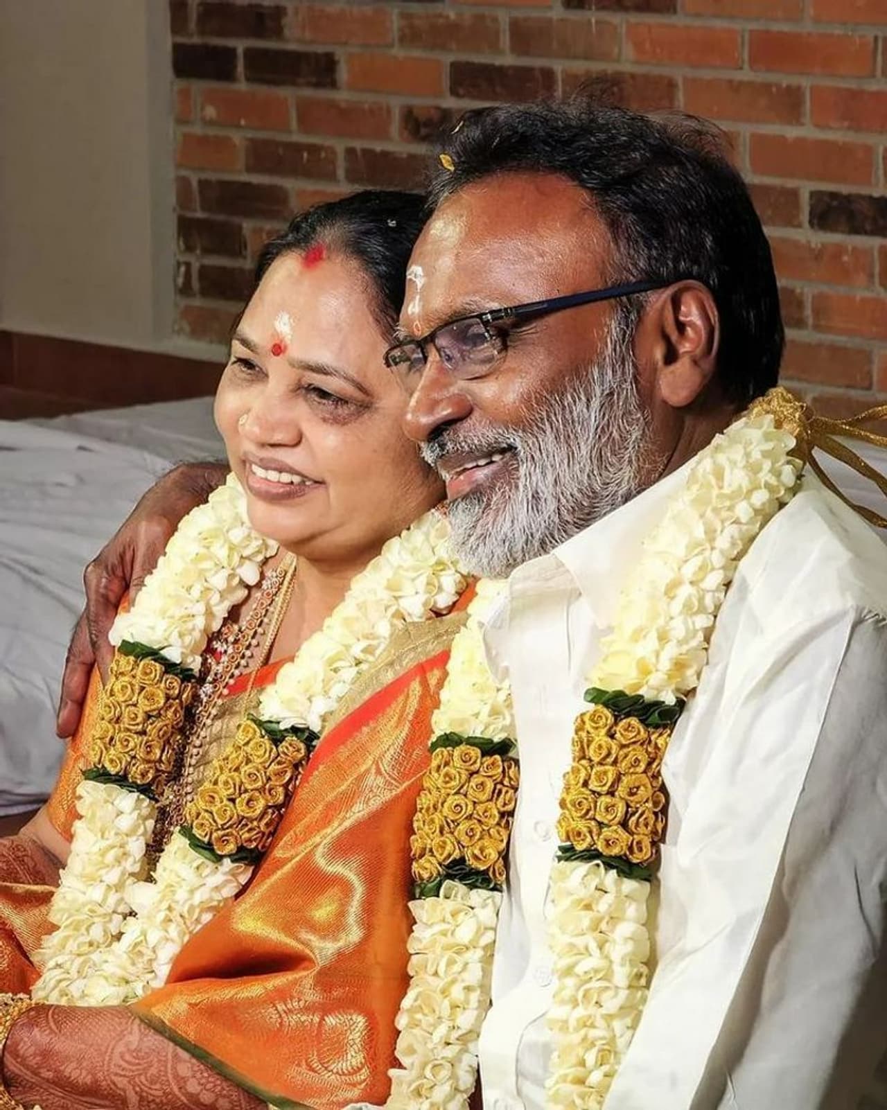 Dhanush parents 70th birthday celebration photo Dhanush parents 70th birthday celebration photo