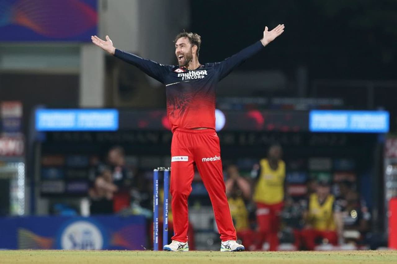 Mumbai: Glenn Maxwell of Royal Challengers Bangalore celebrates the wicket of Krunal Pandya of Lucknow Super Giants, during the Indian Premier League 2022 cricket match between Lucknow Super Giants and Royal Challengers Bangalore, at the DY Patil Stadium in Mumbai, Tuesday, April 19, 2022. (Sportzpics for IPL/PTI Photo)(PTI04_19_2022_000268B)