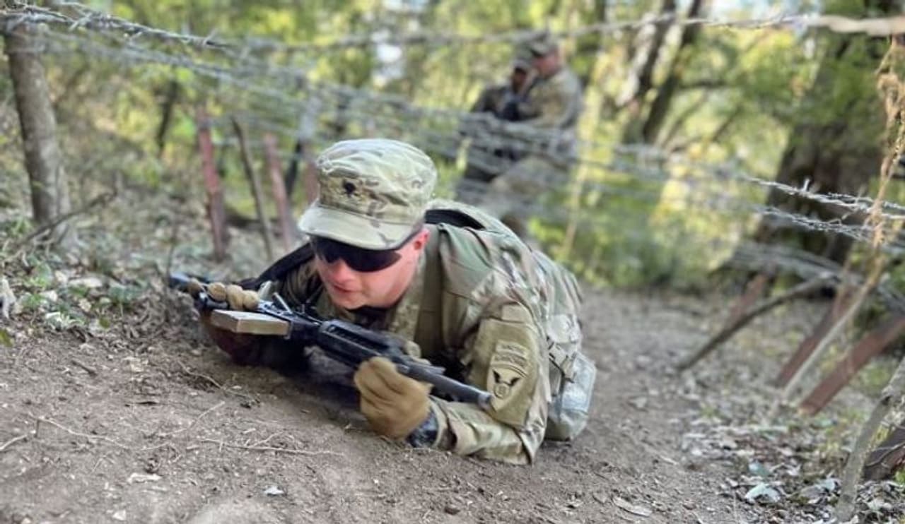 Image: A soldier from 1st Squadron, 40th Cavalry Regiment, 2nd Brigade, 11th Airborne Division low crawls in the slithering lane during exercise Yudh Abhyas 22 at Auli. Photograph: Benjamin Wilson Image: A soldier from 1st Squadron, 40th Cavalry Regiment, 2nd Brigade, 11th Airborne Division low crawls in the slithering lane during exercise Yudh Abhyas 22 at Auli. Photograph: Benjamin Wilson
