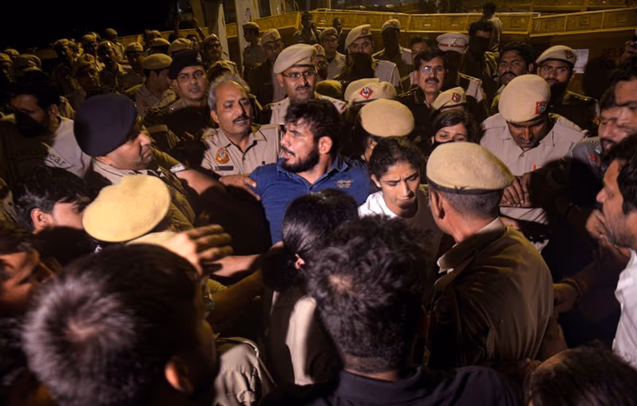 Image: Police personnel and protesting wrestlers in a scuffle at Jantar Mantar, in New Delhi, Wednesday, May 3. Photograph: PTI Photo Image: Police personnel and protesting wrestlers in a scuffle at Jantar Mantar, in New Delhi, Wednesday, May 3. Photograph: PTI Photo