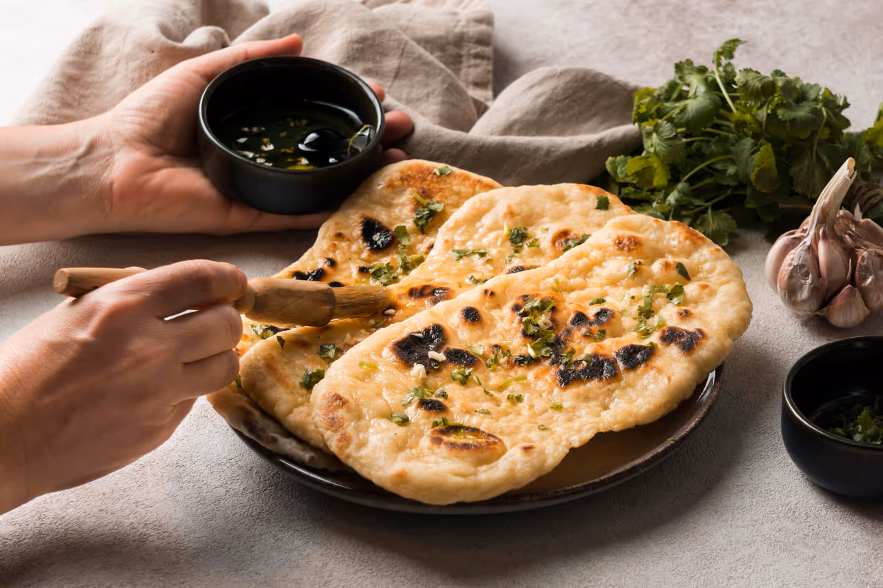 Butter Garlic Naan: India’s Pride on the Global Table Butter Garlic Naan: India’s Pride on the Global Table