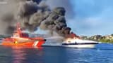 Dramatic rescue of 4 Britons as luxury yacht explodes in flames before sinking off Menorca island (WATCH)