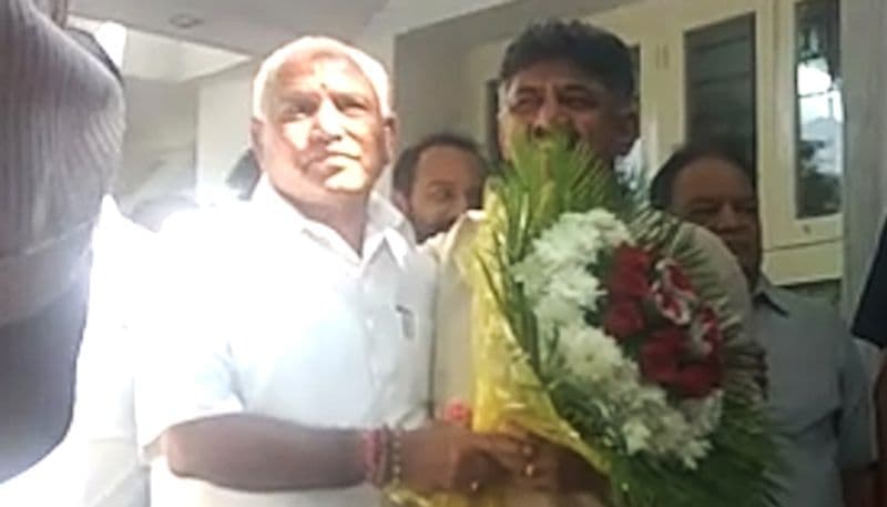 Yeddyurappa meets arch rival DK Shivakumar at his residence in Bengaluru