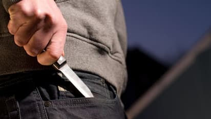 police catch man roaming with knife 