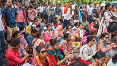 Teachers stage a sit-in protest outside SSC office