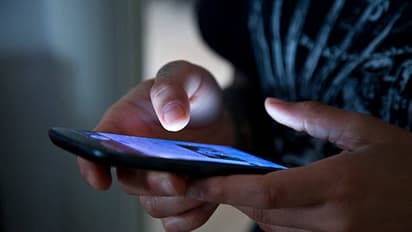 Watching mobile phone reels addict