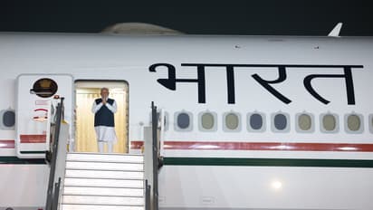Narendra Modi emplanes for Tokyo