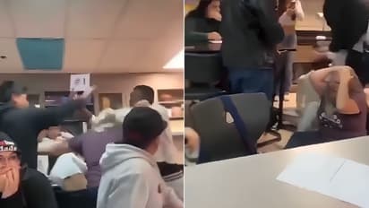 Viral video teacher caught in student fight