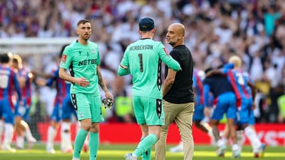 Pep Guardiola and Dean Henderson