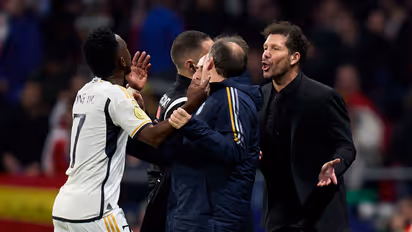 Vinicius Jr and Diego Simeone