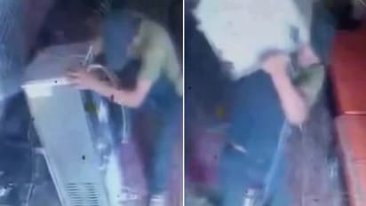 Caught On CCTV: Thief Casually Walks Off With 40 Kg Water Cooler On His Shoulder In Amravati (WATCH Viral Video)