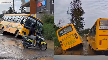 School bus stuck on crater-filled Bengaluru road