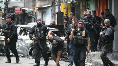 Police raid Rio favelas in massive anti-drug operation killing 64