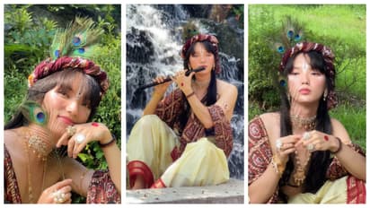 Korean man dressed as Krishna