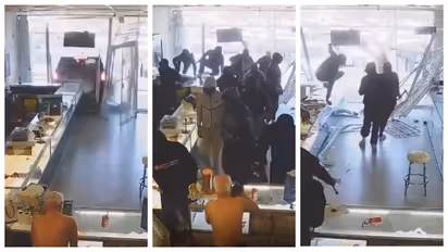 masked robbers ram truck into jewellery shop in us