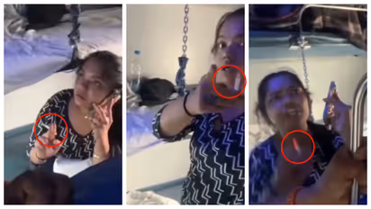 woman smoking inside the train AC coach