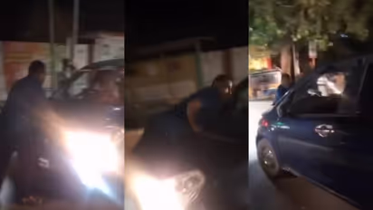 TN police officer dragging man