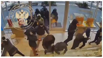 25 mask wearing individuals stole jewelry