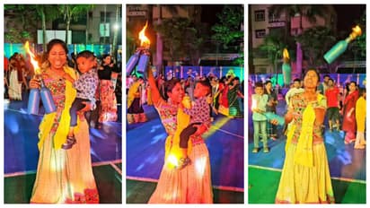 Bartender Juggles Fire Bottles While Holding Toddler