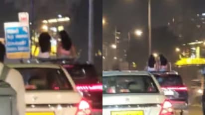 women-spotted-riding-on-sunroof 