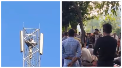 Youth climbing 150 feet high mobile tower