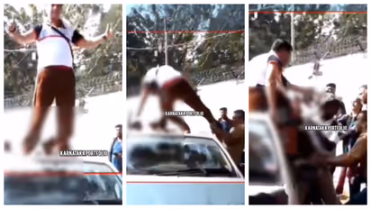 Locals pull down a passenger who climbed on top of a car