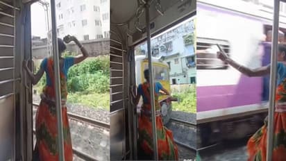 woman throws stone at oncoming train windshield,