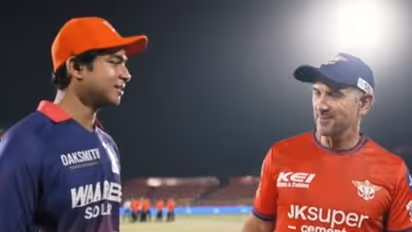 Justin Langer and Vaibhav Sooryvanshi