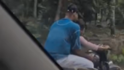 helmetless rider caught carrying child unsafely on bullet motorcycle