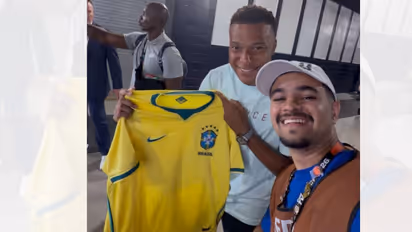 Kylian Mbappe with Brazilian Journalist