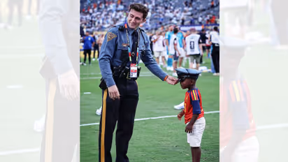 Kenye Yamal with Security Official after Spain's FIFA World Cup Final Win