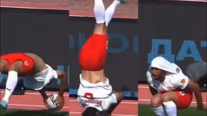 Iranian Defender Somersault During Russian Football Match